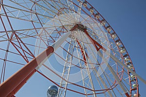 A ferris wheel in the park in Batumi. Brightly colored Ferris wheel against