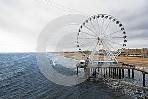 Ferris wheel on the pier of Scheveningen, Hague, the Netherlands, beach entertainment area popular tourist destination