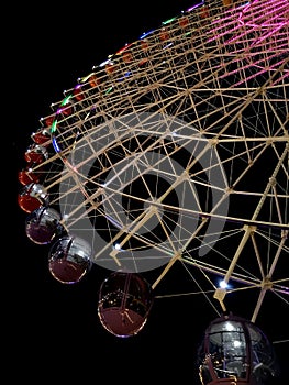 Ferris wheel in the playground at night is beautiful