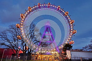 Ferris wheel in Prater, at night - landmark attraction in Vienna, Austria photo