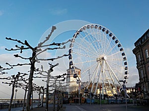 The Ferris wheel beside the River photo