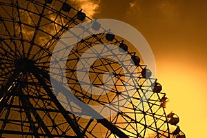 Ferris wheel silhouette during sunset photo