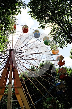 Ferris wheel on sky background