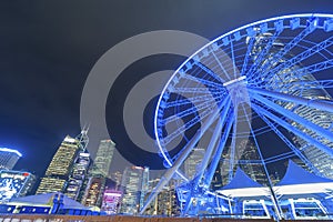 Ferris Wheel and skyline in Hong Kong City