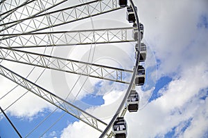 Ferris Wheel soaring his over the Miami waterfront at Bayside Market Place