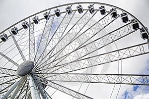 Ferris Wheel soaring his over the Miami waterfront at Bayside Market Place