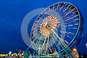 Ferris wheel spin outdoor motion at twilight.