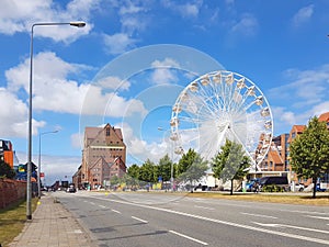 ferris wheel stands on hanse sail in rostock