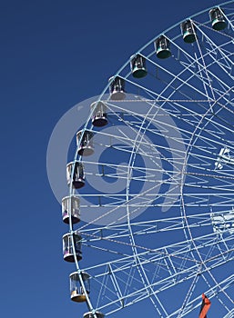 Ferris wheel Texas Star and setting moon