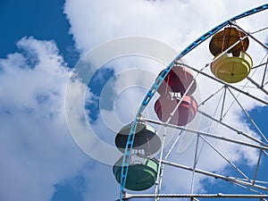 Ferris Wheel three colored cabin with skyes