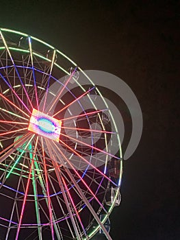 Ferris wheelin lights night photo