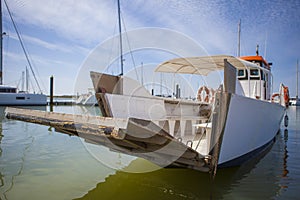 Ferry approaching to El Rompido Marina, Spain photo