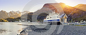 Ferry arrival and unloading in Moskenes, Lofoten Islands photo