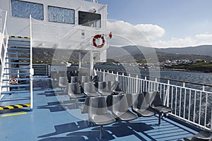 A ferry arrives at the island of andros