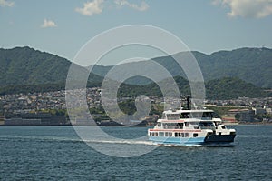 A ferry boat crossing the inland sea between Miyajimaguchi Pier and Miyajima island in Hiroshima