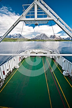 Ferry boat in fiord photo