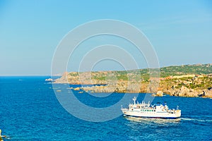 Ferry boat navigating to Santa Teresa of Gallura, Sardinia Italy photo