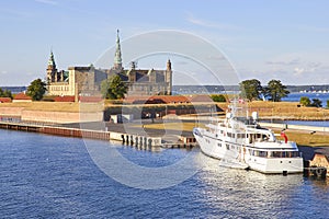 Ferry boat at pier, Kronborg castle at backgroung, Danmark, Europe