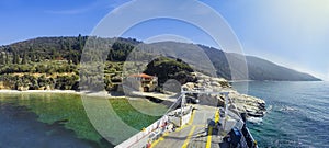 Ferry boat pov arriving at port at Mount Athos