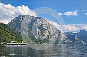 Ferry boat sails on Lake Traun Traunsee in Austria photo