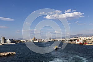 Ferry boats, cruise ships docking at the port of Piraeus, Greece