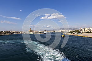 Ferry boats, cruise ships docking at the port of Piraeus, Greece