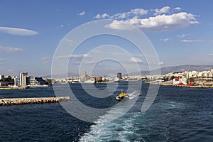 Ferry boats, cruise ships docking at the port of Piraeus, Greece