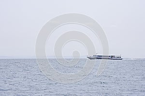 Ferry boats transfers visitors in the sea at Koh Kood, Trat in Thailand