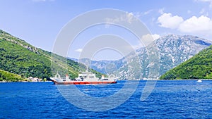 Ferry in the Boko-Kotor Bay, Montenegro photo