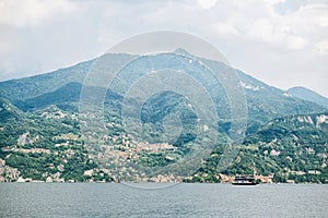 Ferry on Como Lake. Panoramic Landscape