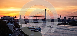 Ferry Crossing River at Sunset