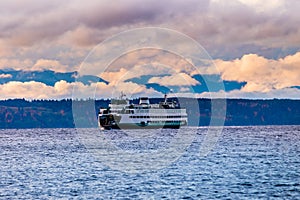 Ferry cruises with mountains and cloudy, Seattle, Washington State