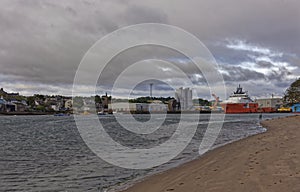 Ferry den Fishing Village at the Port Of Montrose, with Offshore Supply Vessels moored at the Port.