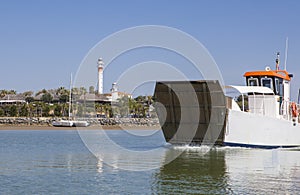 Ferry departs from El Rompido Marina, Huelva, Spain photo