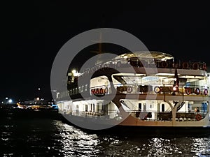 The ferry docked at the pier at night, Istanbul, Turkey