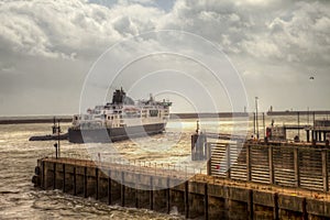 Ferry at Dover port in stormy weather.