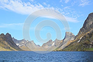 Ferry in the fjord of Reine in Lofoten