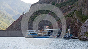 Ferry landing of Koman on Lake Komani in Albania photo