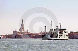 Ferry over the Canale della Giudecca, Venice Italy photo