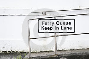 Ferry queue keep in lane sign at Largs Scotland UK photo