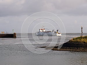 Ferry Rottum departs Lauwersoog, crossing Waddensea to Schiermonnikoog, Netherlands photo