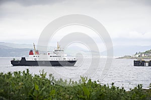 Ferry ship arriving at Scottish town of Wemyss Bay photo