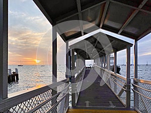 A ferry terminal on Minjerribah / North Stradbroke Island, Moreton Bay, Australia, at sunset