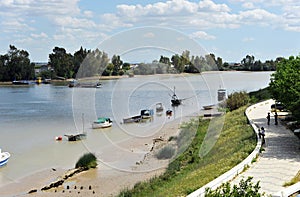 Ferryboat across the Guadalquivir River as it passes through Coria del RÃ­o, Sevilla, AndalucÃ­a, Spain