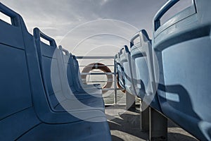 Ferryboat seats and lifebuoys