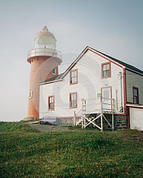 Ferryland Lighthouse in morning mist, Ferryland, Newfoundland and Labrador, Canada