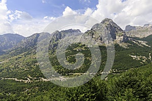 Fertile landscape in the dinaric alps with green forests on the way from shkodar to theth