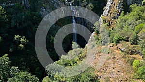 Fervenza do Toxa Waterfall In The Midst Of Lush Tropical Mountains