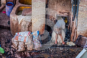 Man working Chouara Tannery, Fez, Morocco