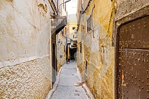Fes, Morocco. View of the narrow and suggestive alleys in the ancient souk of the medina in Fes in Morocco.